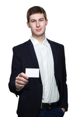 young business man with empty business card on white background