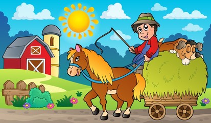 Fototapeta premium Hay cart with farmer near farm