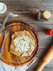 rye biscuit with goat cheese and herbs, before baking