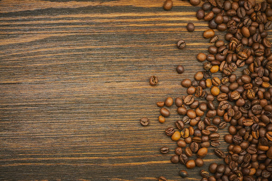 Coffee beans background. Roasted coffee. Top view. Selective focus. Place for text
