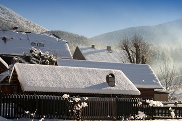 TERCHOVA, SLOVAKIA-January 16: Typical village wooden buildings in northern Slovakia in Zilina district. With its location is a tourist center of Mala Fatra Mountains and cultural area in Stefanova