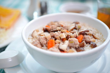 Boiled rice pork or mush for breakfast.