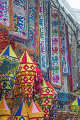 colorful lanterns and banners depicting the elephants in the market in the Indian quarter of Singapore