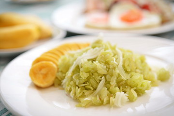 shredded rice grain with Coconut Flesh and Banana thaifood