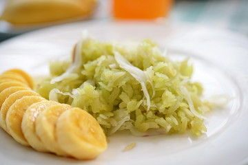 shredded rice grain with Coconut Flesh and Banana thaifood