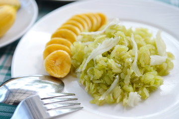 shredded rice grain with Coconut Flesh and Banana thaifood