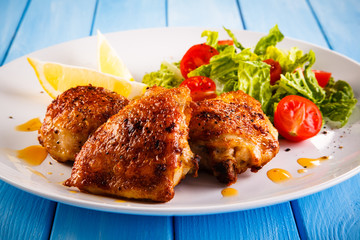 Grilled chicken thighs and vegetables