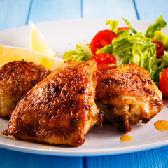 Grilled chicken thighs and vegetables