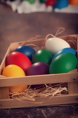 Colorful Easter Eggs Decorated on Wooden Background