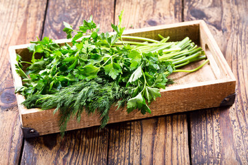 green herbs in a box