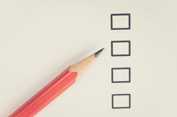 Empty checklist with pencil.