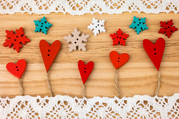 Button love trees with snowflakes on  wooden background with lace. Post card for the Valentine. Button love. Wooden buttons. Valentine's Day postcard. Wedding.invitation.