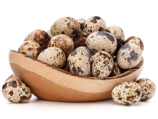 quail eggs in wooden bowl isolated on white background cutout