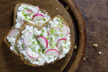 Bread with cottage cheese , radish and chives