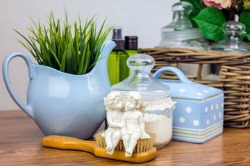 Bath accessories. Personal hygiene items. Bathroom setting. Composition of cosmetic bottles, soap, towel, bath salts and brush. Care for personal hygiene concept. Spa composition.