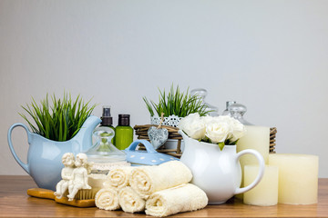 Bath accessories. Personal hygiene items. Bathroom setting. Composition of cosmetic bottles, soap, towel, bath salts and brush. Care for personal hygiene concept. 