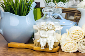 Bath accessories. Personal hygiene items. Bathroom setting. Composition of cosmetic bottles, soap, towel, bath salts and brush. Care for personal hygiene concept. 