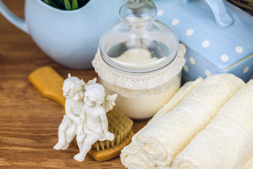 Bath accessories. Personal hygiene items. Bathroom setting. Composition of cosmetic bottles, soap, towel, bath salts and brush. Care for personal hygiene concept. Spa composition.