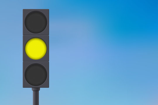 Traffic Lights With Yellow Light On.