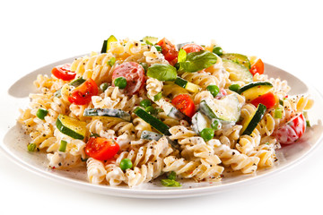 Fusilli pasta with white sauce and vegetables 
