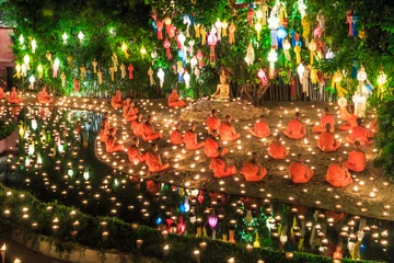 Poster Bouddha CHIANG MAI THAILAND-NOVEMBER 17 : Buddhas are praying in Loy Krathong festival in Chianmai province of Thailand