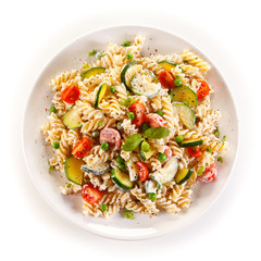 Fusilli pasta with white sauce and vegetables 