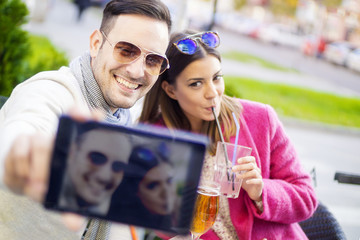 Young couple taking a selfie