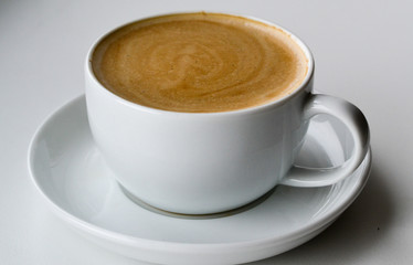 Coffee cappuccino cup on a white background