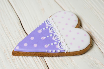 the original baking - gingerbread hearts on white wood background