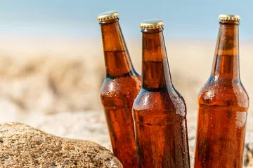 Tuinposter Beer on the beach © blackday