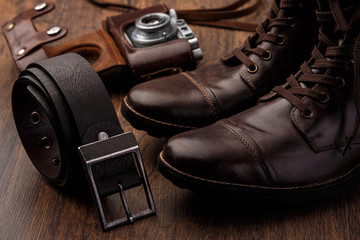Leather boots and belt - obrazy, fototapety, plakaty