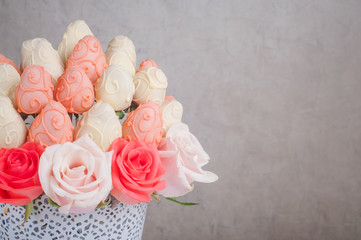 Fresh strawberry covered by pink and white chocolate