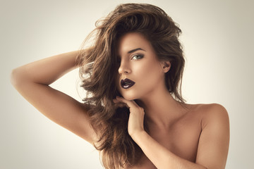 Beautiful woman with dark lipstick © blackday