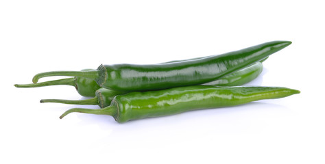 green chili on white background