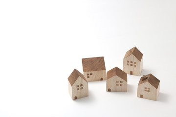 Miniature houses on white background. 