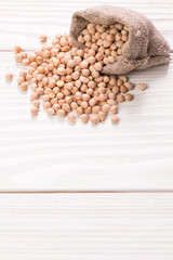 chickpeas on rustic background, healthy food concept