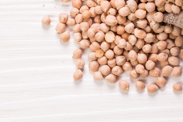 chickpeas on rustic background, healthy food concept