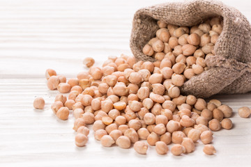 chickpeas on rustic background, healthy food concept