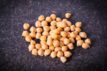 chickpeas on rustic background, healthy food concept