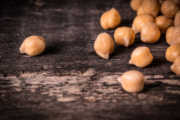 chickpeas on rustic background, healthy food concept