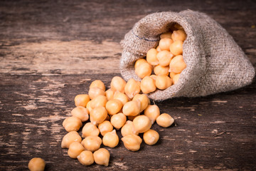 chickpeas on rustic background, healthy food concept