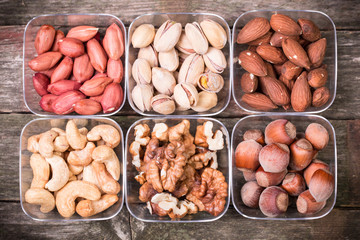 Mix nuts on wooden table,healthy vegan food.