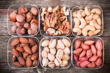 Mix nuts on wooden table,healthy vegan food.