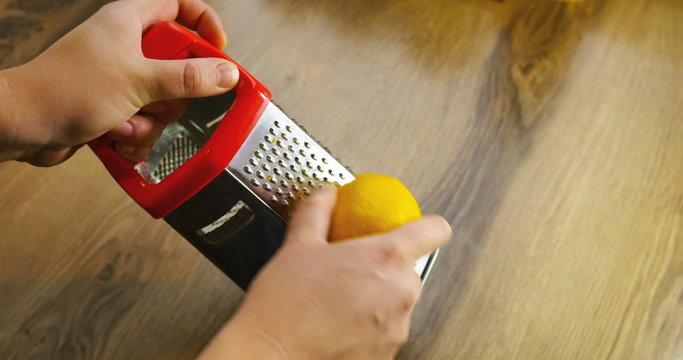 Lemon zest being grated 4k