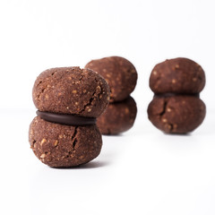 Italian cookies called baci di dama made with nuts and chocolate