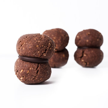 Italian cookies called baci di dama made with nuts and chocolate