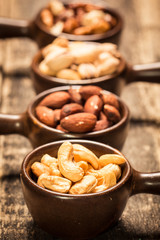 Mix nuts on wooden table,healthy vegan food.