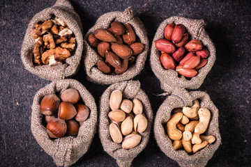 Mix nuts on wooden table,healthy vegan food.