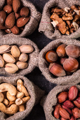Mix nuts on wooden table,healthy vegan food.