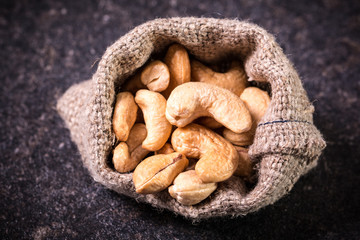 Mix nuts on wooden table,healthy vegan food.